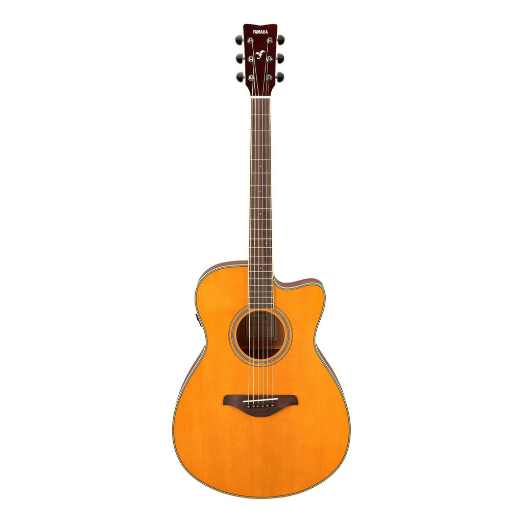 Yamaha FSC-TA concert style cutaway acoustic guitar in vintage tint with natural wood finish and detailed craftsmanship.