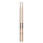 Vic Firth American Classic Metal Wood Tip Drumsticks, showing a pair of wooden-tipped sticks on a drum set.