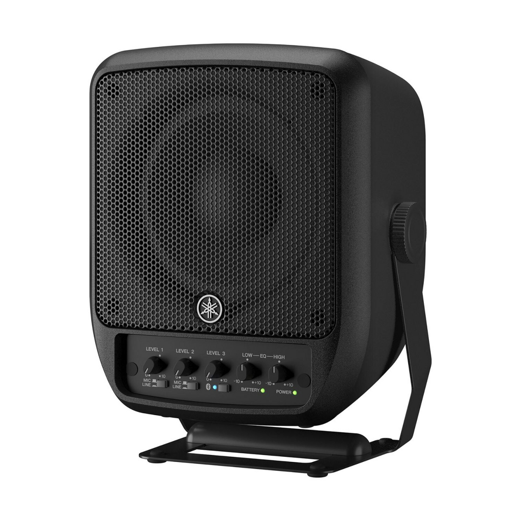 Yamaha STAGEPAS 100BTR portable powered speakers set up for performance, featuring sleek black design and control panels.