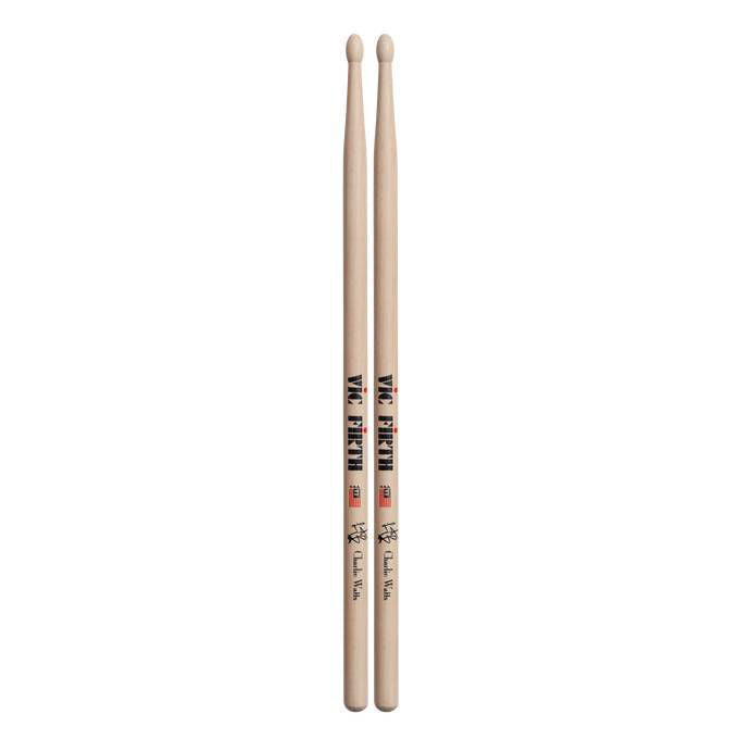 Vic Firth Charlie Watts Signature Series wood tip drumsticks on a drum set, showcasing their design and brand branding.