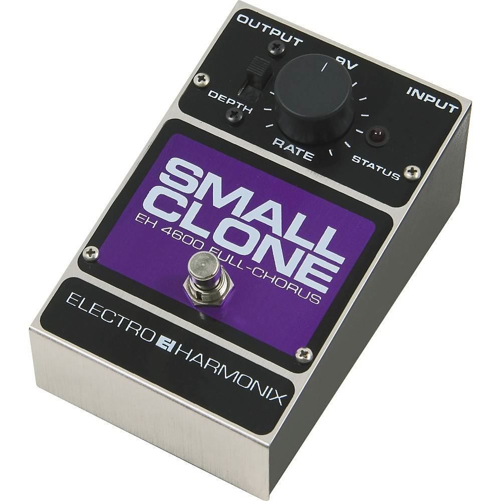 Electro-Harmonix Small Clone guitar effects pedal with control knobs and footswitch on a black pedalboard.