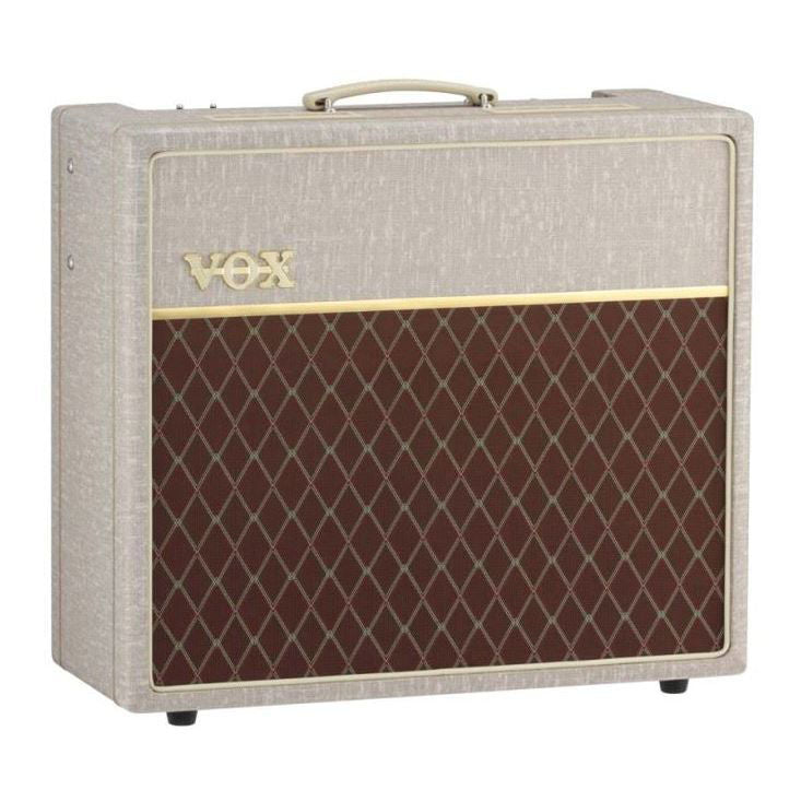 Vox AC15HW1X handwired combo guitar amplifier with vintage-style control panel and speaker grille, featuring tube amplifier design.