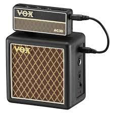 Vox amPlug 2 Speaker Cabinet guitar amplifier accessory with black finish and control knobs for portable guitar sound enhancement