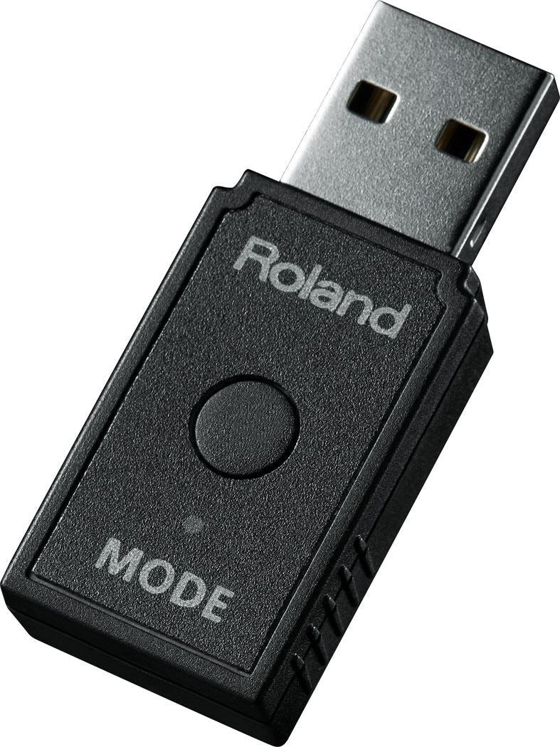 Roland WM-1D wireless MIDI dongle with data cable connections and compact design for seamless music production.