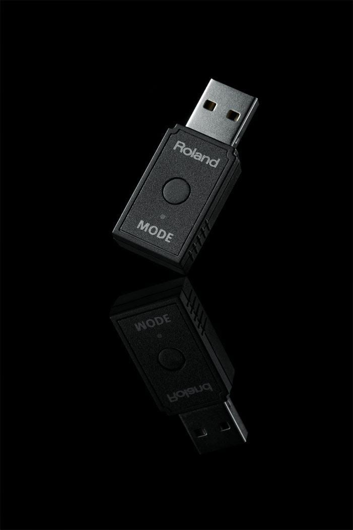 Roland WM-1D Wireless MIDI Dongle with USB connection for seamless data transfer and connectivity.