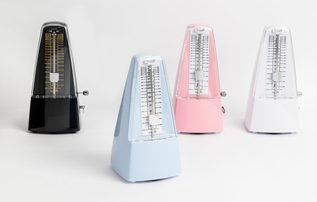 Cherub Pyramid Style Mechanical Metronome with Bell, GMI guitar accessory, showing the classic pyramid shape and metal bell detail.