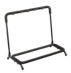 XTR Xtr Multi 3 guitar stand holding three electric guitars, compact guitar accessory for easy instrument storage.