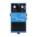 BOSS XS1 Poly Shifter compact effects pedal with control knobs, mounted on a pedalboard for guitar sound modulation.