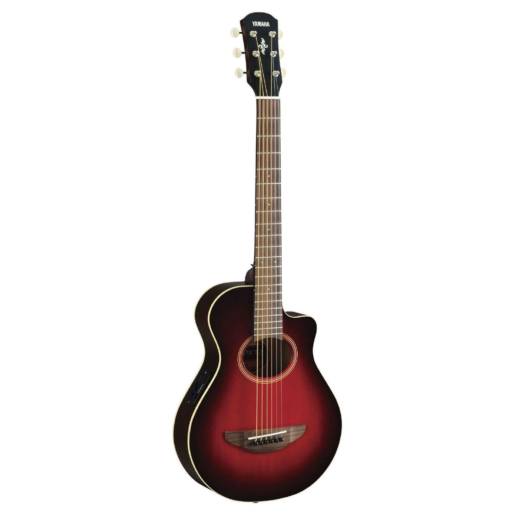 Yamaha APXT2DRB 3/4 acoustic guitar in dark red burst finish with black gig bag, showing the compact size and detailed wood grain.