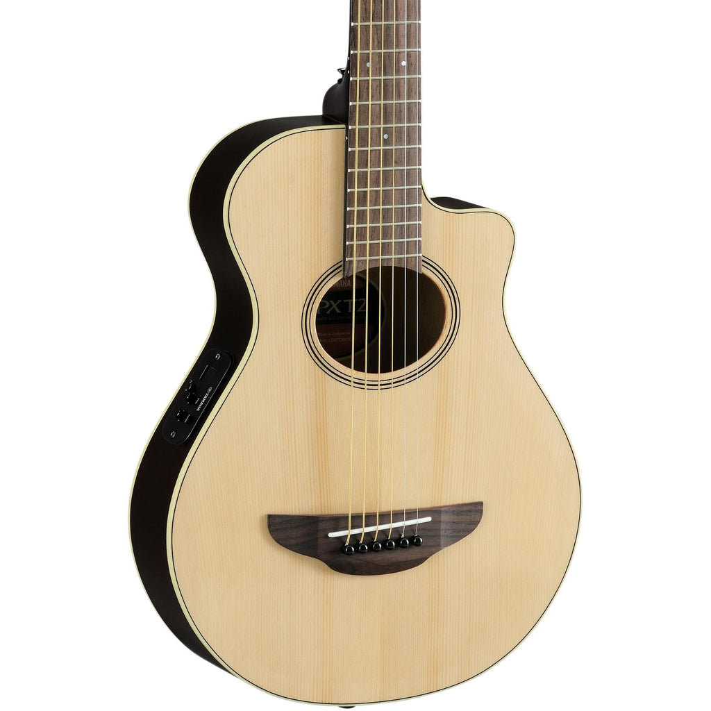 Yamaha APXT2NT 3/4 acoustic guitar in natural finish with a padded gig bag, displayed on a plain background.