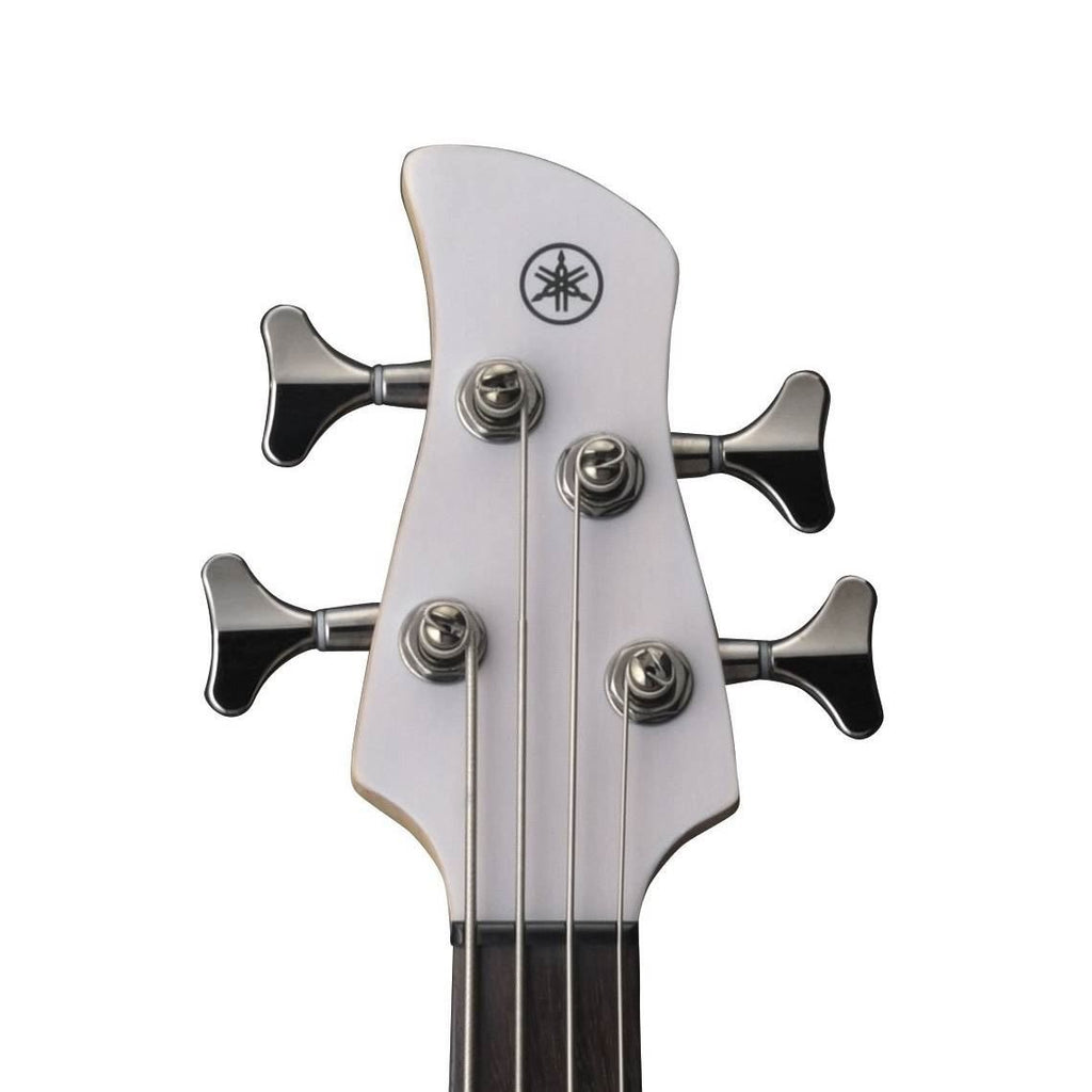 Yamaha TRBX504 4-string bass guitar with maple and mahogany neck in translucent white, shown from a side angle.