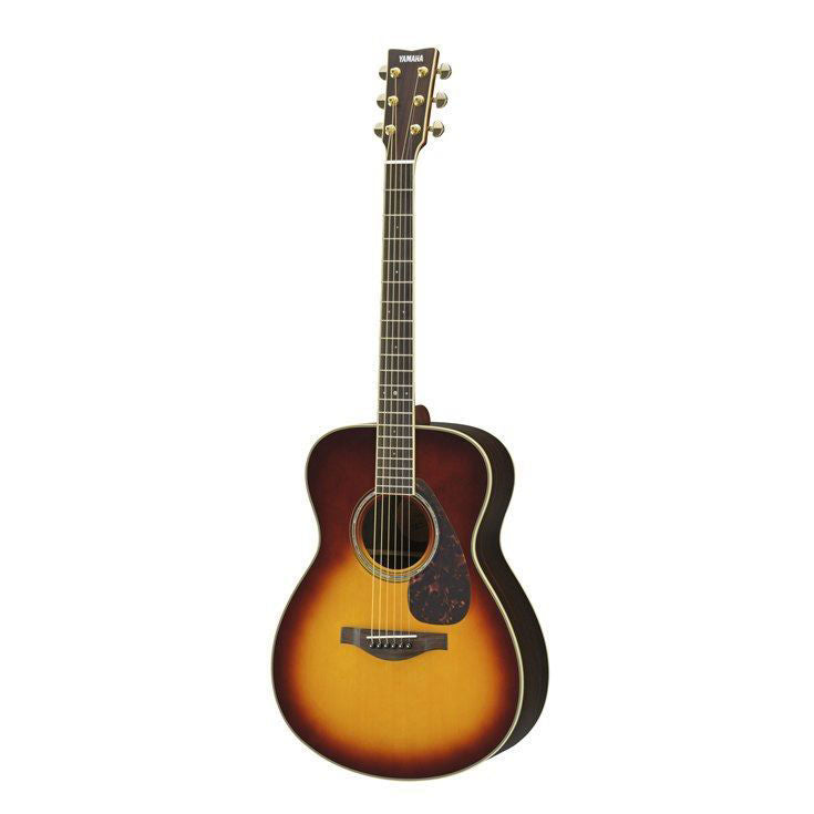 Yamaha LS6-BS//ARE acoustic guitar with brown sunburst finish, showcasing its body, soundhole, and bridge.
