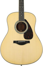 Yamaha LL6M ARE jumbo size acoustic guitar with natural finish and piezo pickup, featuring a classic acoustic guitar design.