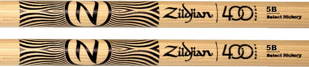 Zildjian LE 400th Anniv. 5B Acorn drumsticks in clear and black with 60s rock design, featuring wooden tips and ergonomic grip.