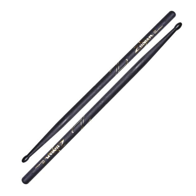 Zildjian Hickory 5B Nylon Black drumsticks resting on a drum set, showcasing their sturdy design and black nylon tips.