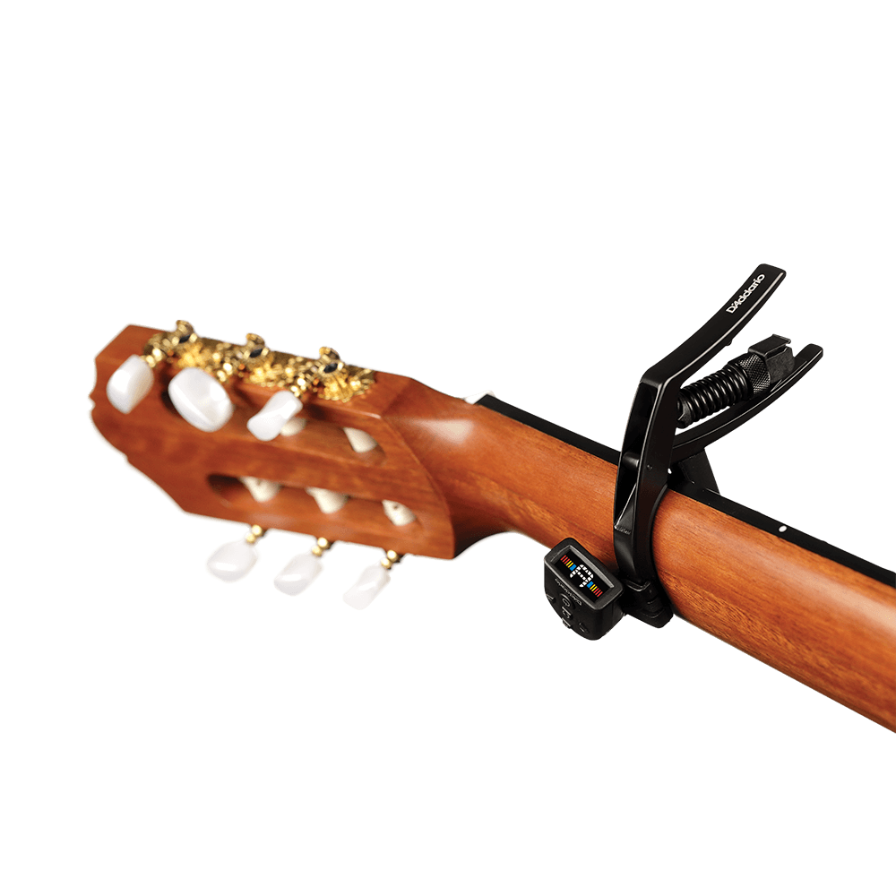 D'Addario Planet Waves PW-CP-13 Artist Classical Guitar Capo in black, shown on an acoustic guitar neck with a transparent background