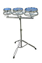 DXP Roto Toms 6, 8, 10-inch with stand, drum hardware and accessories, featuring chrome finish and mounted on a sturdy stand.