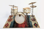 DRUMnBASE Earthing Native Red 185 × 165 cm rug shown with a drum kit; drums not included