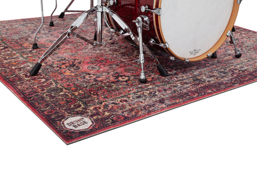 Close-up of DRUMnBASE ST185 Persian Red Rug, 185cm x 165cm, showcasing detailed texture and vibrant color for drum hardware setup.