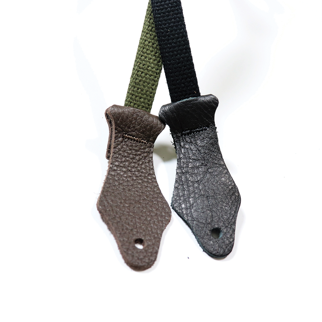 Black Franklin 5/8-inch cotton ukulele strap with leather ends, featuring black glove leather accents and adjustable length.