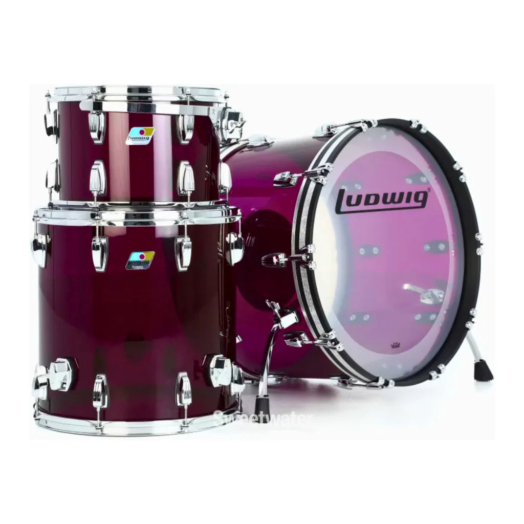 Ludwig Vistalite 3-piece purple drum kit with toms, bass drum, and snare, featuring clear acrylic shells and hardware.