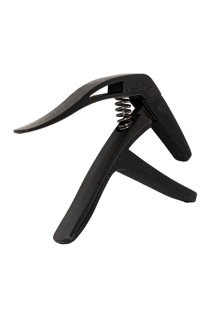 Stagg SCPX-CU BK curved trigger guitar capo on an acoustic and electric guitar, in black, with a smooth curved design.