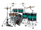 Mapex Marine Teal Burst drum kit with 22-inch bass, 10, 12, 14, and 16-inch shells, showing the colorful, polished drums.